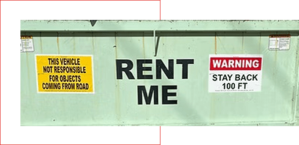 A dumpster with the words 'RENT ME' painted on it.